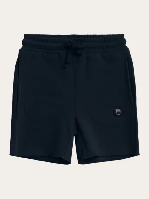 Sweat shorts - GOTS/Vegan - Total Eclipse Knowledge Cotton